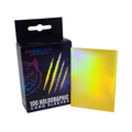 Box of Prismatic Defender holographic card sleeves with a sample sleeve displayed.
