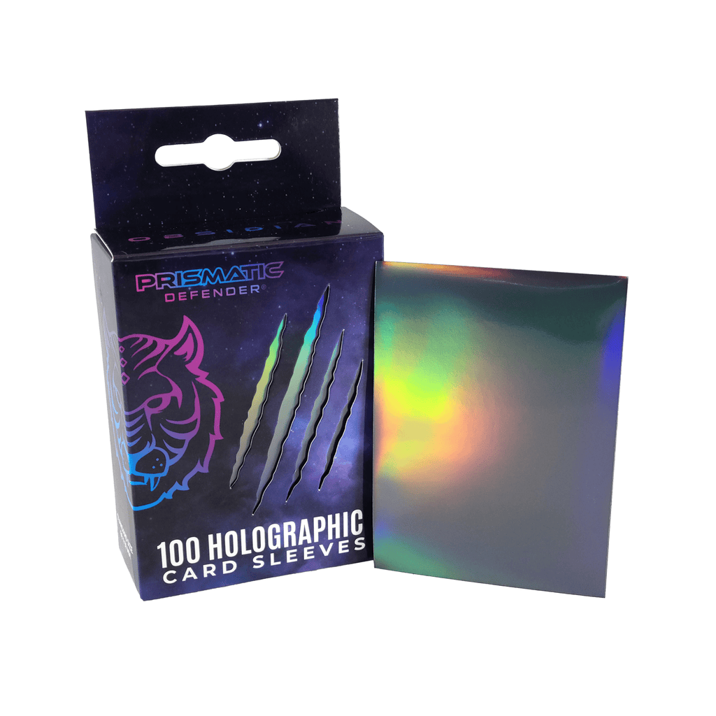 Box of Prismatic Defender holographic card sleeves with a sample sleeve displayed.

