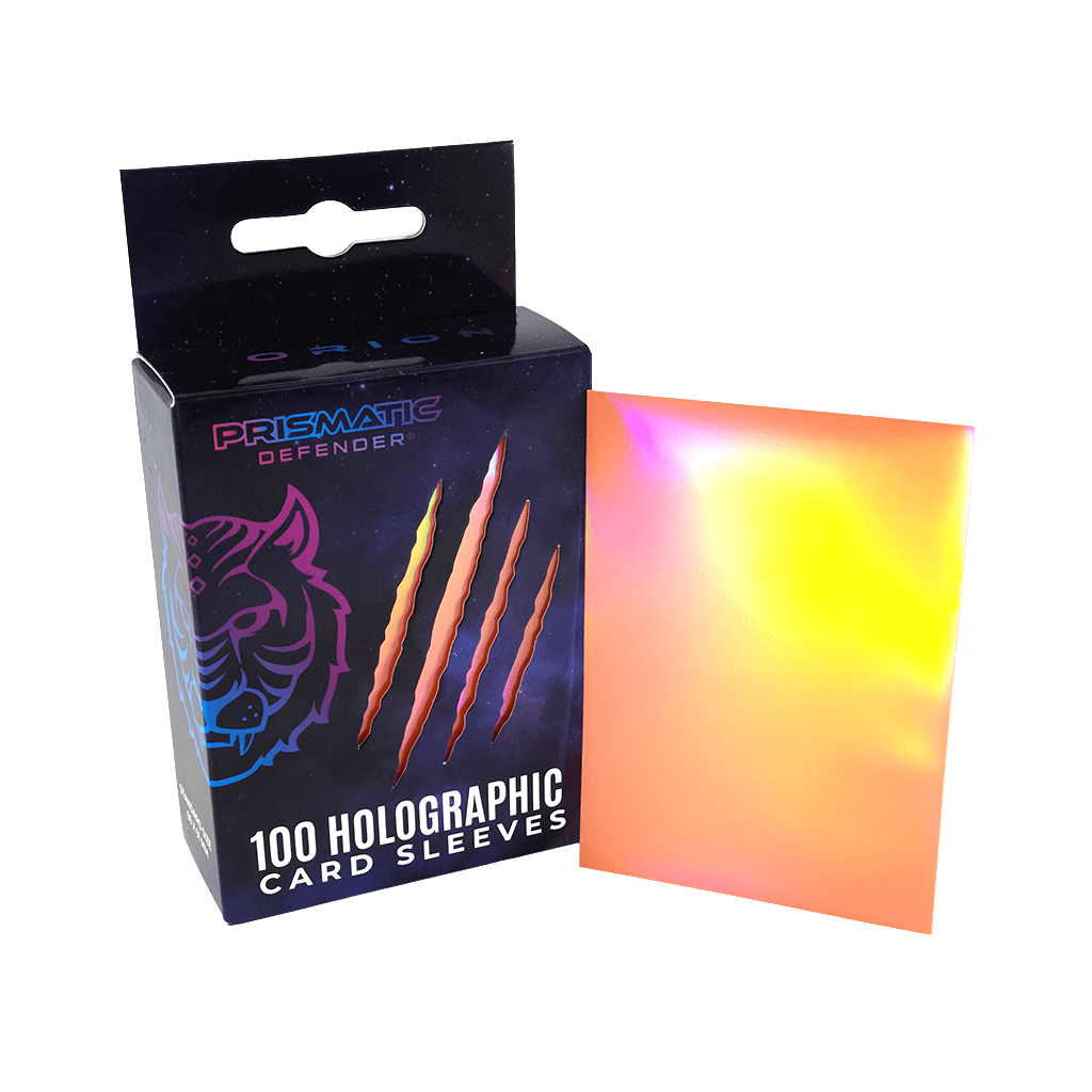 Box of Prismatic Defender holographic card sleeves with a sample sleeve displayed.
